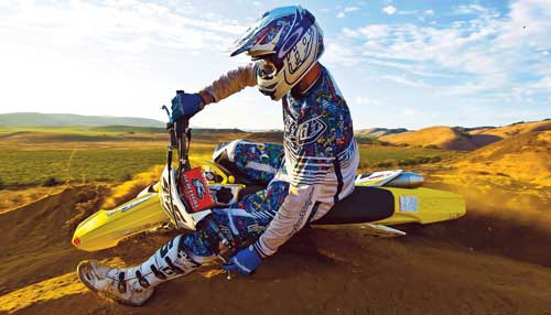 cornering dirt bike in a bermed corner