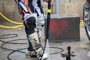 pressure washer cleaning motocross boot